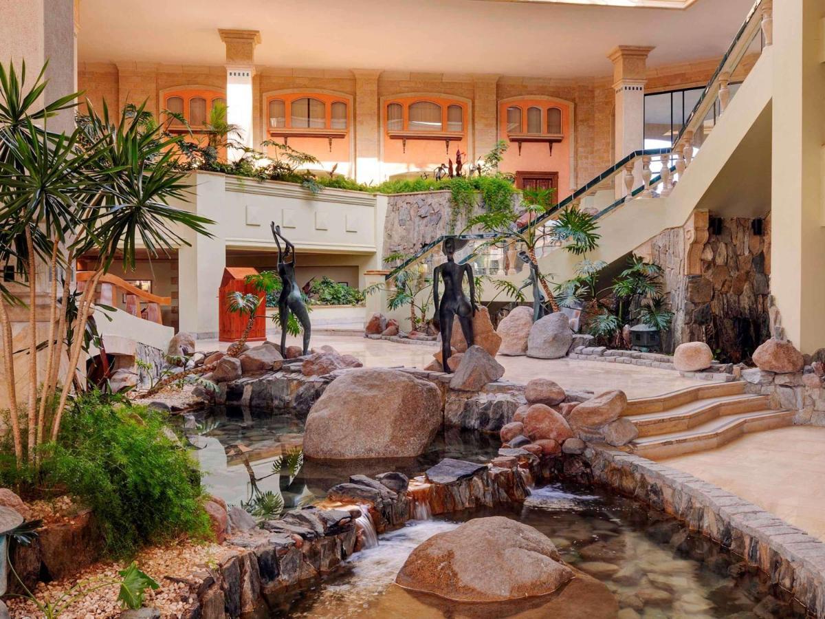 Naama Bay Promenade Beach Resort Managed By Accor Sharm el-Sheikh Exterior photo The lobby of the Hilton Anatole