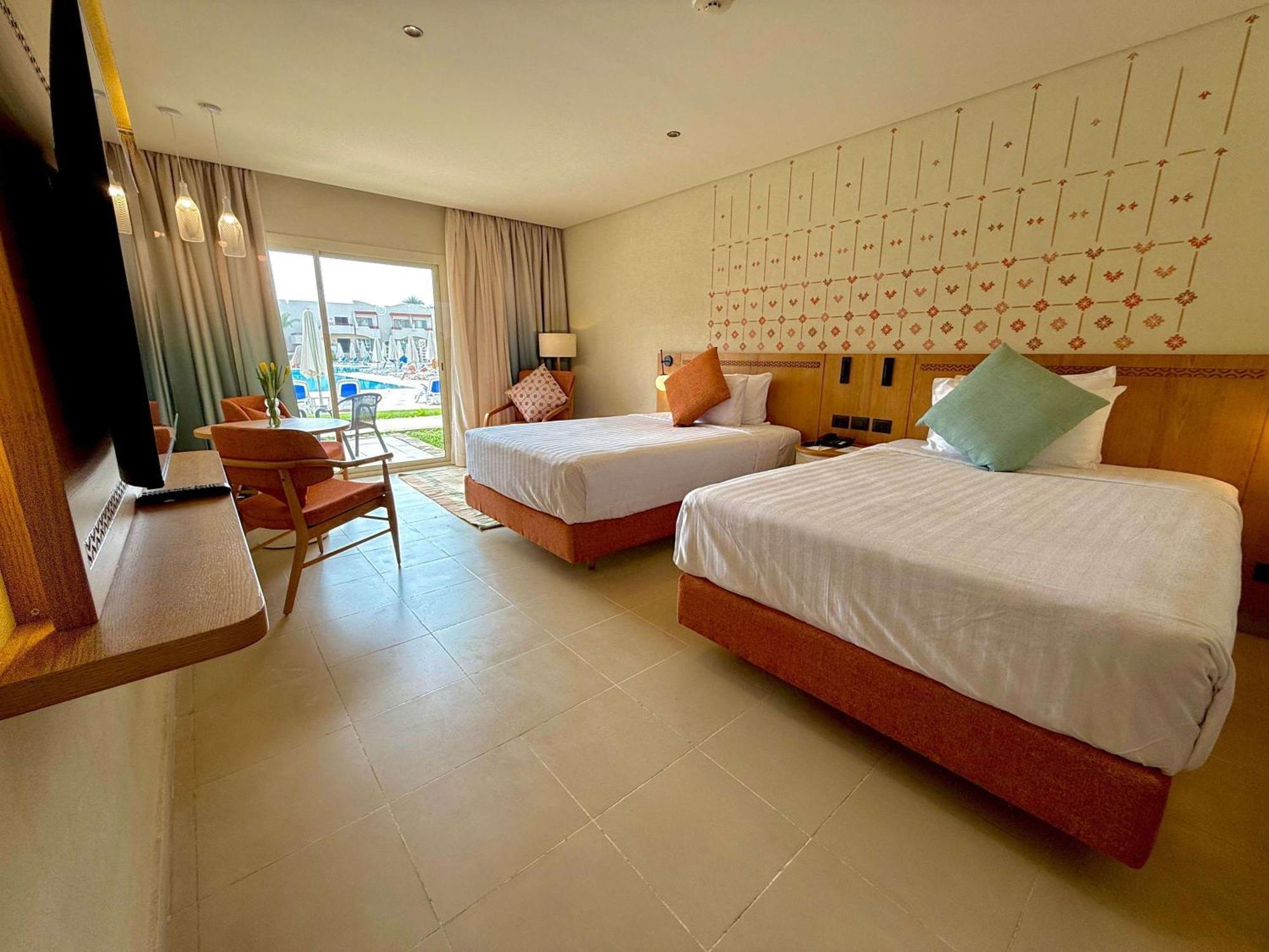 Naama Bay Promenade Beach Resort Managed By Accor Sharm el-Sheikh Exterior photo Deluxe room at the hotel